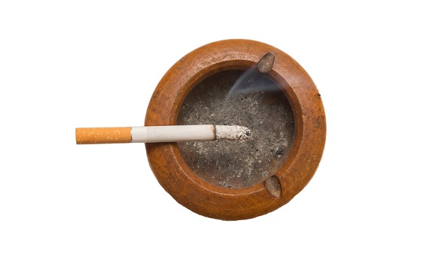 Cigarette on ashtray